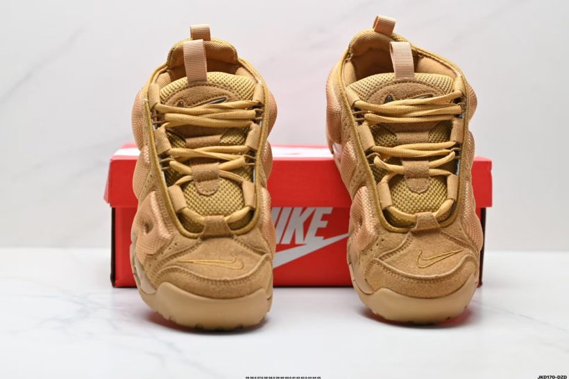 About Us - Air More Uptempo 414962 Air More Uptempo 414962 A bold ’90s basketball icon with oversized “AIR” graffiti-style lettering, elastic straps for easy wear, and visible Air cushioning in heel, forefoot, and midfoot.