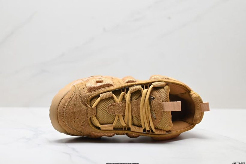 About Us - Air More Uptempo 414962 Air More Uptempo 414962 A bold ’90s basketball icon with oversized “AIR” graffiti-style lettering, elastic straps for easy wear, and visible Air cushioning in heel, forefoot, and midfoot.